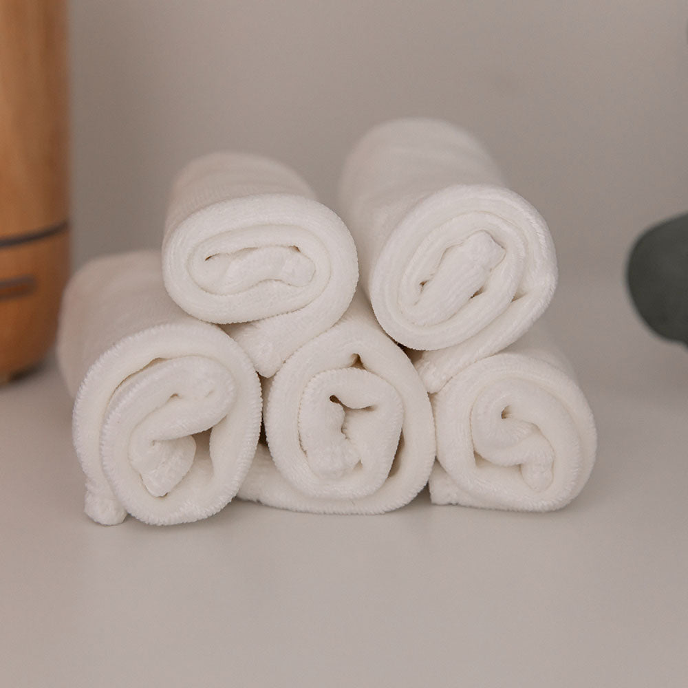 5 pack of cloth wipes rolled and stacked on top of each other